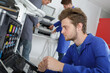 © auremar - apprentice is repairing a printer at class