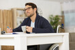 © auremar - male handicapped writer reflecting what to write