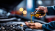 © Laura - Oil pouring process, engine lubrication, mechanic performing service, automotive maintenance procedure, fluid addition careful, professional care ensuring, faceless technician hand