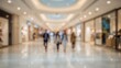 © Sona - People walking inside a shopping mall with stores on both sides. Retail, commerce, and shopping concept. Modern shopping mall interior. The concept of retail and retail therapy