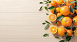 © Humdan AI - Fresh citrus fruit arrangement with orange slice and whole orange on white wooden background with green leaf and flower decoration