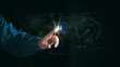 © PRIM - Businessman touching virtual AI icon. Future artificial intelligence technology concept with digital data background, machine learning, and global smart business network innovation.