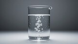 Beaker with rising water bubbles
