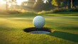 © Zargham - Golf ball resting near the hole on a sunny green course