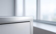 © Jirawatfoto - Clean domestic white corner table top or washing machine with blur glass window background for product display montage