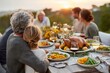 © Anna Lurye - Family gathered around a beautifully set Thanksgiving table, enjoying a festive meal with a golden turkey, colorful dishes, and warm sunset ambiance creating a joyful atmosphere