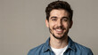© K silver - Professional portrait of a cheerful young man smiling confidently showcasing natural beauty, casual style, and positive emotion in a modern indoor setting