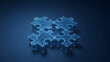 © dotmagic - Four interconnected glowing blue puzzle pieces forming a cohesive unit against a dark background