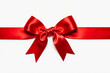 ©   - Vibrant red satin ribbon bow on a white background