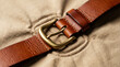 © yang - constriction. Over-tightened leather belt leaving deep impression marks on surface. lifestyle magazines, social media lookbooks, designed for lifestyle magazines and social media content.