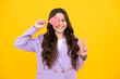 © Olena - Cool teen child with lollipop over yellow isolated background. Sweet childhood life. Teen girl with yummy lollipop candy. Happy teenager, positive and smiling emotions of teen girl.