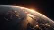 © Koplexs-Stock - Earth view from space with city lights and sunrise over the horizon.
