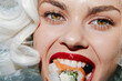 © VICHIZH - Glamorous woman with white hair enjoying sushi, showcasing vibrant colors and expressive emotions, perfect for food and lifestyle concepts.