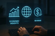 © Sweettymojidesign - Economic insights and revenue growth concept with digital icons and hands typing on keyboard in dark office environment