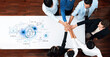 © InfiniteFlow - A diverse group of professionals joins hands over a table, symbolizing teamwork and collaboration in cybersecurity strategy with a digital lock graphic, showcasing commitment to data protection. Trope