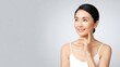 © Hoki - Elegant Asian woman with radiant skin showcasing beauty and skincare.