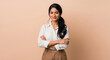 © Shivani - Confident Young Indian Woman Smiling with Arms Crossed