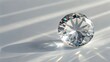 © MIkrom - Brilliant Cut Diamond Reflecting Light With Rainbow Refractions On White Background With Dramatic Shadows