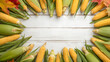 © Hanna Ohnivenko - Farmhouse corn on white wood table. Healf food. Vegan, vegetarian food. Autumn, summer top view with copy space. Flat lay for lettering, your text, blogs, magazines, headers, freelanse