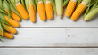 © Hanna Ohnivenko - Farmhouse corn on white wood table. Healf food. Vegan, vegetarian food. Autumn, summer top view with copy space. Flat lay for lettering, your text, blogs, magazines, headers, freelanse
