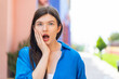 © luismolinero - Young pretty woman at outdoors surprised and shocked while looking right