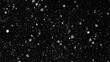 © Arma - Heavy snowfall effect with large, blurred, white snowflakes and smaller particles falling rapidly against an isolated black background