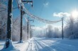 © Pete - Snow covered rural landscape features electric power lines. Frost clings to trees and poles on cold day. Winter scene shows power supply with ice. Blue sky brightens snowy countryside road.