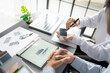 © Charlie's - Solar panels green energy Business man working green eco friendly office business creative idea Planing Bio economy for business eco friendly professional Engineer sustainable electricity.