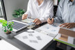 © Charlie's - Solar panels green energy Business man working green eco friendly office business creative idea Planing Bio economy for business eco friendly professional Engineer sustainable electricity.