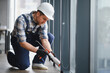 © Serhii - Construction worker applying sealant to window frame