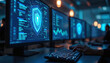 © Viktor - Multiple computer monitors display digital shield icons and data graphs in a modern office. A hand types on a keyboard near glowing screens. Cyber security and network protection concept.