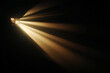 © Tohamina - abstract golden light rays piercing darkness