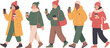 © fatimatz - Five diverse people dressed in warm winter clothes walk carrying phones and coffee cups