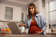 © milanmarkovic78 - Pregnant Woman Having Online Class