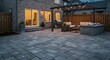 © Kraengkrai - A beautiful residential backyard patio constructed with interlocking stone pavers, perfect for outdoor dining and relaxing area ,residential ,custom ,floor