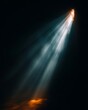 © grey - A powerful beam of white-blue light cutting through deep darkness, illuminating drifting particles.