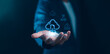 © Suriya - A professional holds futuristic cloud data icons, symbolizing digital network storage, modern business computing, infrastructure management, security, and global technology transformation.