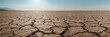 © vxnaghiyev - Cracked earth in an arid landscape, highlighting erosion risk in a drought-prone region