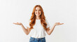 © Pixora - Redhead young girl spreading hands sideways showing blank copy space area