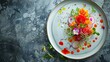 © Ummeya - Artfully plated seafood dish with vibrant edible flowers and sauce drizzle
