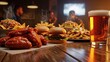© yevhen89 - Hot chicken wings, burgers, fries, and nachos served with a cold beer on a rustic wooden table in a busy pub at night
