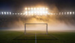 © Kiki - The solitary football goal stands on a foggy pitch, illuminated by the powerful stadium lights on a dark night