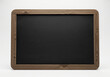 © Alpona - Blank black chalkboard with wooden frame on white background