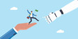 © Sanjoy - Businessman leaping from human hand to robot hand holding a flag