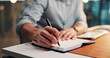 © P2000/peopleimages.com - Media agency, hands and man with notebook, writing and planning for submission. Closeup, person and journalist in office, agenda and brainstorming for article, schedule and creativity with ideas