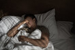 © kieferpix - Stressed Man Lying in Bed Covering His Face in Morning Light