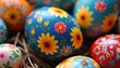 © Pete - Vibrant Ukrainian pysanky eggs adorned with intricate floral motifs displayed in natural straw. Traditional symbols of spring rebirth and cultural heritage.