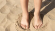 © K silver - Relaxing on the beach barefoot moments sand footprints coastal environment close-up perspective summer vibes
