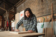© Dani Nahuel/Stocksy - Female Woodworker Refining Wooden Surface