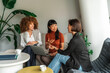 © Aleksandra Jankovic/Stocksy - Friendly Business Meeting Among Friends in a Modern Lounge